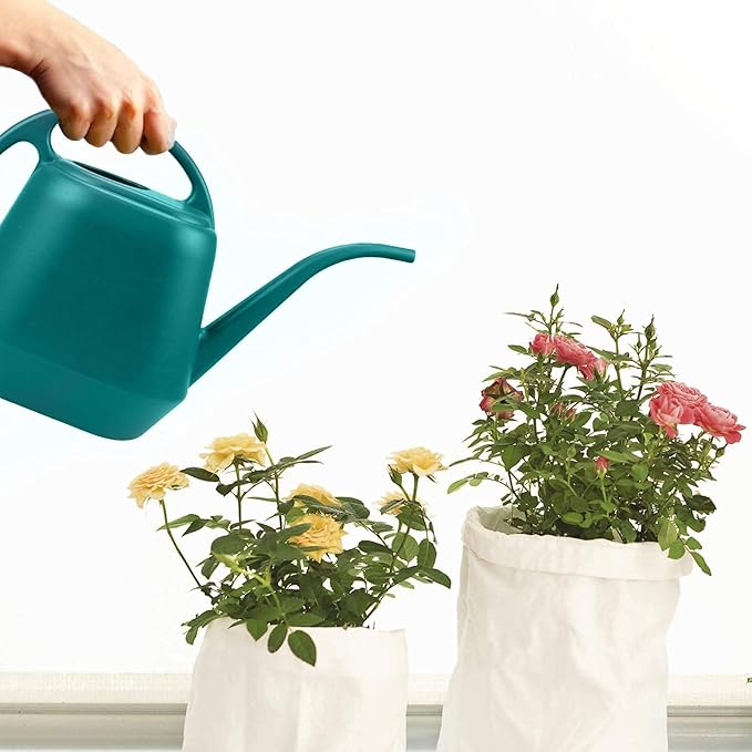 Vintage Teal Gardening Watering Can: Elegant and Practical, Aiding Plant Care