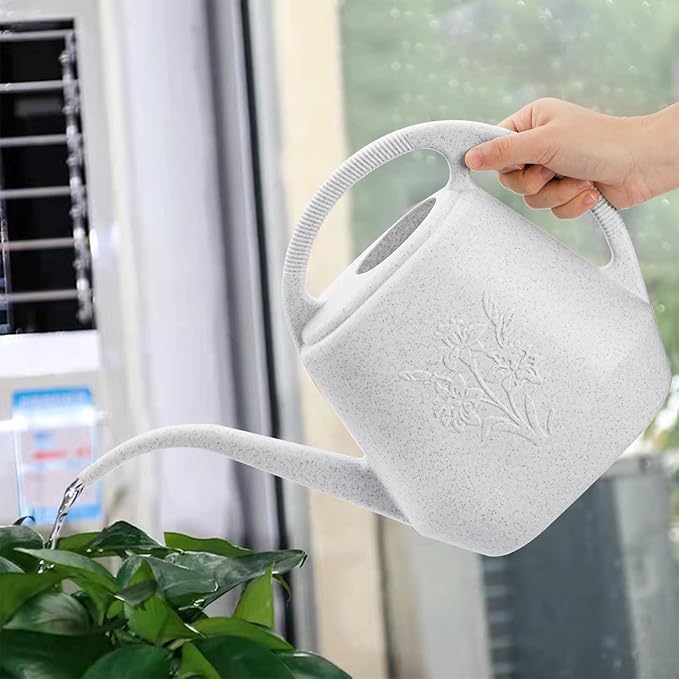 Light Gray Gardening Watering Can with Floral Patterns: Aesthetic and Practical, Aiding Plant Care